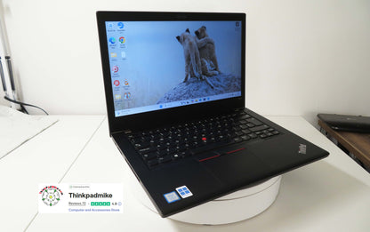 Lenovo ThinkPad T480 laptop open showing keyboard and screen